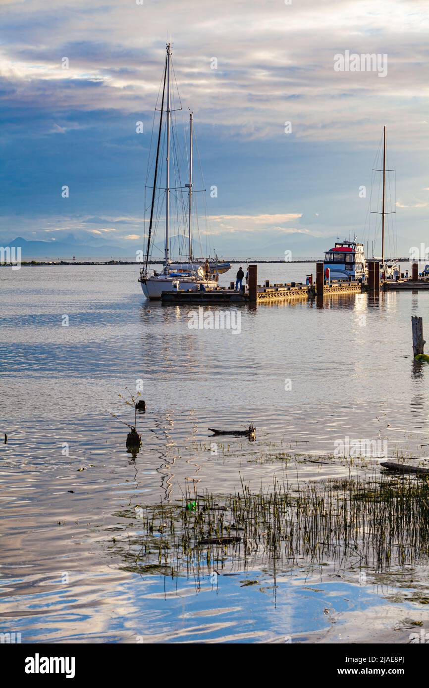 Boats docked along the Steveston waterfront in British Columbia Canada Stock Photo
