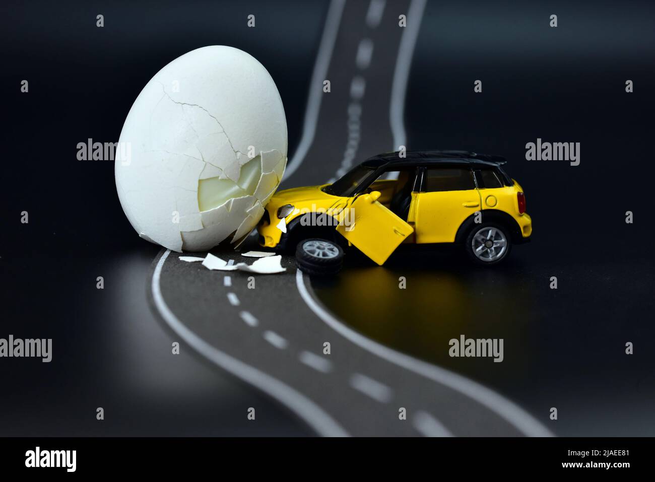 egg with toy car chrash accident funny picture Stock Photo