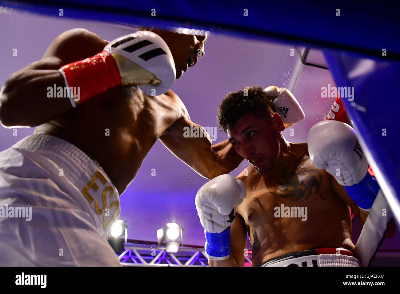 SAO PAULO, BRAZIL - May 29: (L-R) Esquiva Falcão punches Cristian Fabian “El Tuca” Rios in their super middleweight bout during Boxing For You 11 Event at Arena de Lutas on May 29, 2022 in São Paulo, SP, Brazil (Photo by Leandro Bernardes/Pximages) Credit: Px Images/Alamy Live News Stock Photo