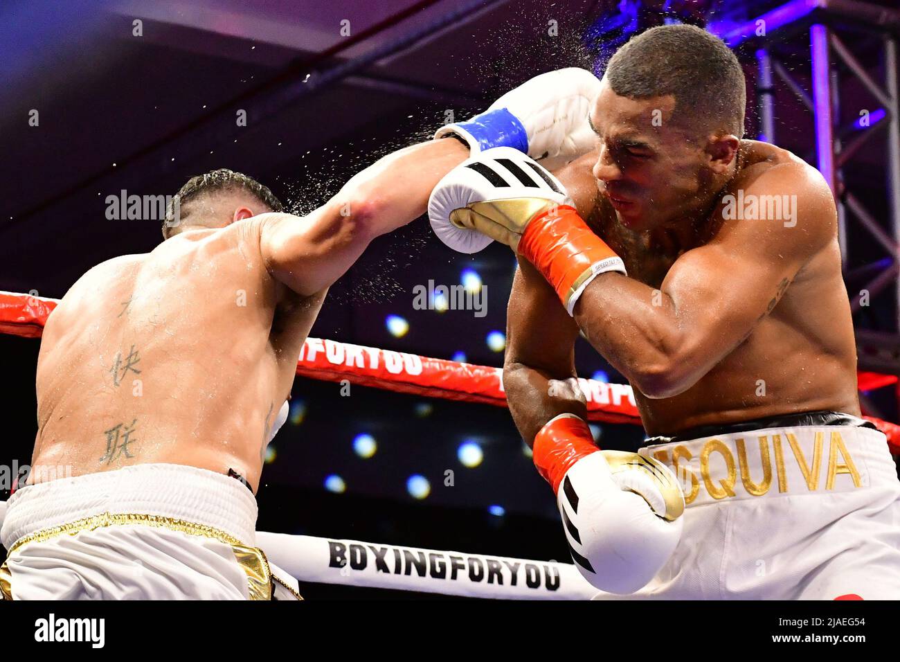 SAO PAULO, BRAZIL - May 29: (L-R) Cristian Fabian “El Tuca” Rios punches Esquiva Falcão in their super middleweight bout during Boxing For You 11 Event at Arena de Lutas on May 29, 2022 in São Paulo, SP, Brazil (Photo by Leandro Bernardes/Pximages) Credit: Px Images/Alamy Live News Stock Photo