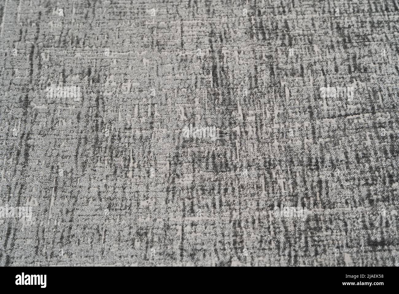 Natural gray textile texture background. Bedspread close up. Stock Photo