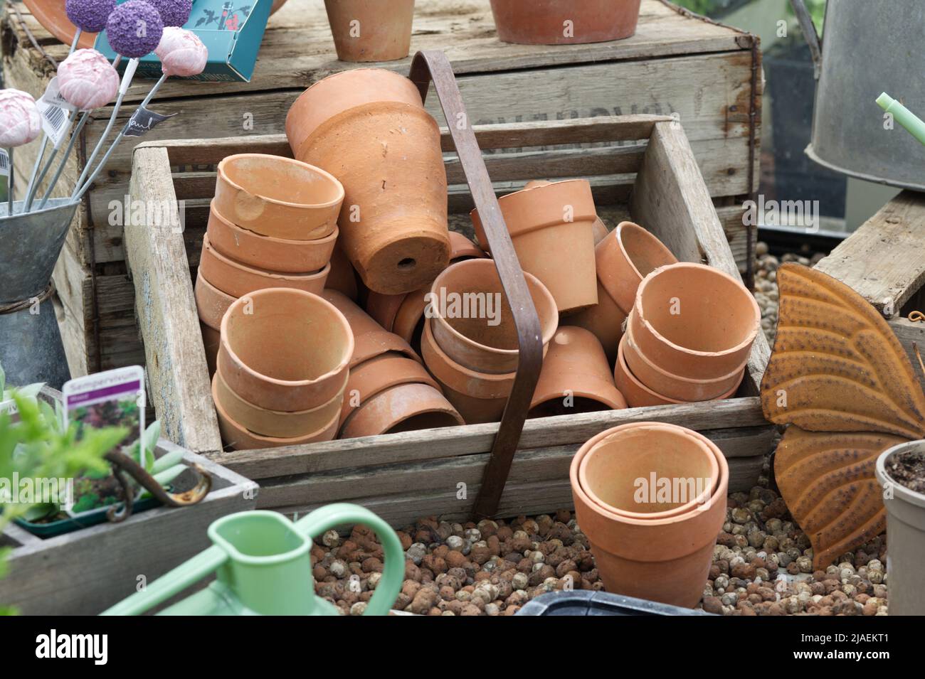 Terracotta flower pots in a garden shed Stock Photo