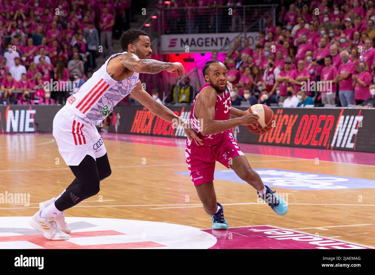 Bonn, Deutschland. 28th May, 2022. Parker JACKSON-CARTWRIGHT (BN, re.) on the ball, in duels versus Nick WEILER-BABB (FCB, left.), action. Final score 68:80. Basketball 1.Bundesliga/Telekom Baskets Bonn-FC Bayern Munich/1. Semi-final playoff, in the TELEKOMDOME, on May 28th, 2022 Credit: dpa/Alamy Live News Stock Photo