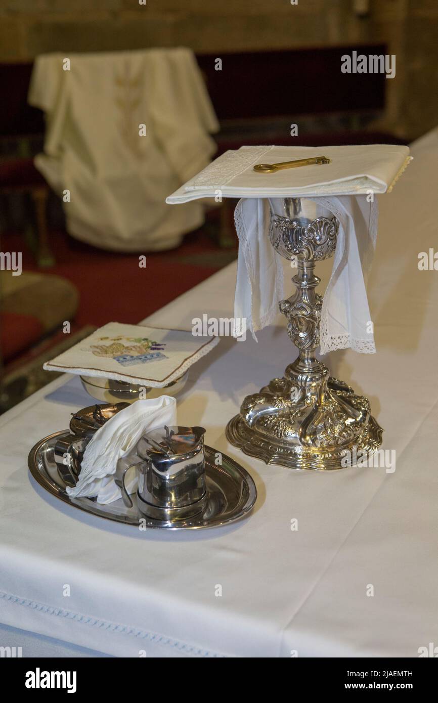Plasencia, Spain - May 21h, 2022: Chalice, wine, water pitcher and pyx at Saint Nicholas Church, Plasencia, Caceres, Extremadura, Spain Stock Photo