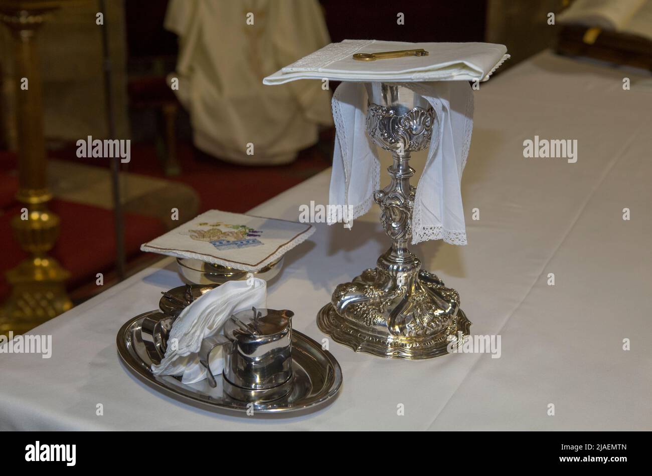 Plasencia, Spain - May 21h, 2022: Chalice, wine, water pitcher and pyx at Saint Nicholas Church, Plasencia, Caceres, Extremadura, Spain Stock Photo