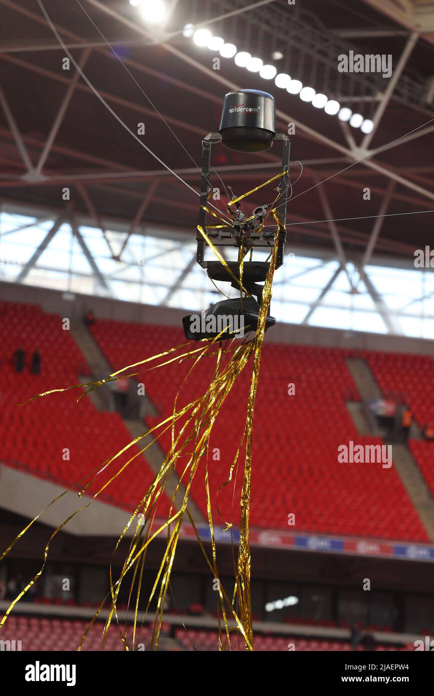 Golden Tocker London, UK. 29th May, 2022. The Spider-Cam covered with golden ticker ...
