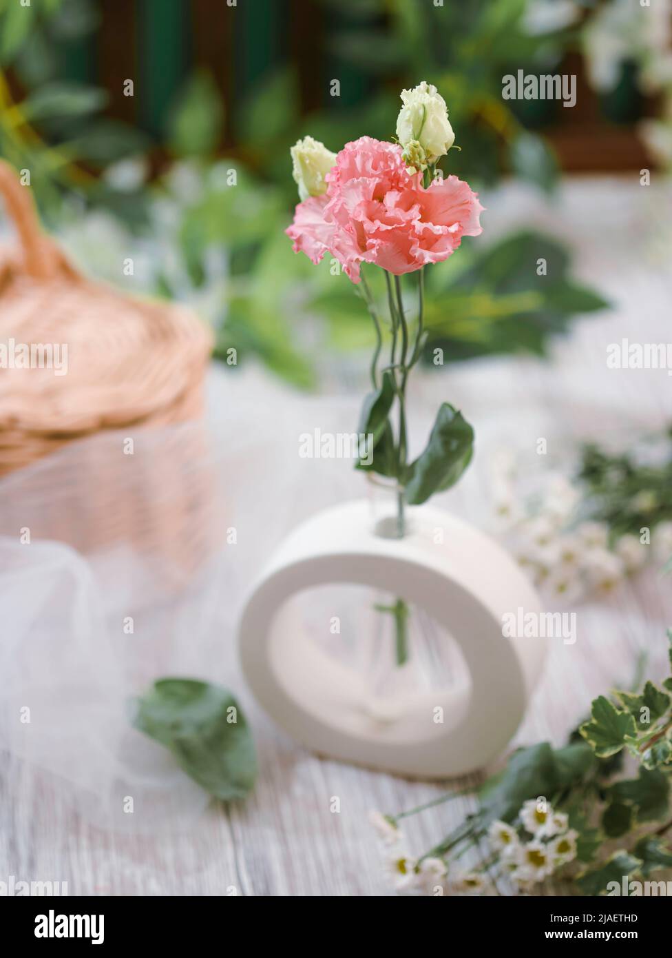 White Tender handmade plaster vase. Modern home decoration. Selective focus Stock Photo