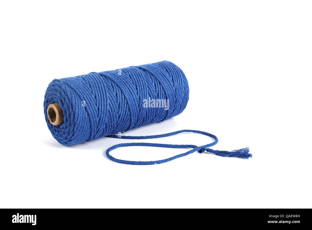 Blue Color Skein single strand Cotton cord rope for macrame on white. Use  for DIY handcraft. Closeup Textile bobbin reel Stock Photo - Alamy