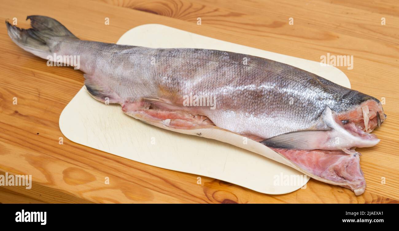 Top view of chum salmon on wooden table Stock Photo