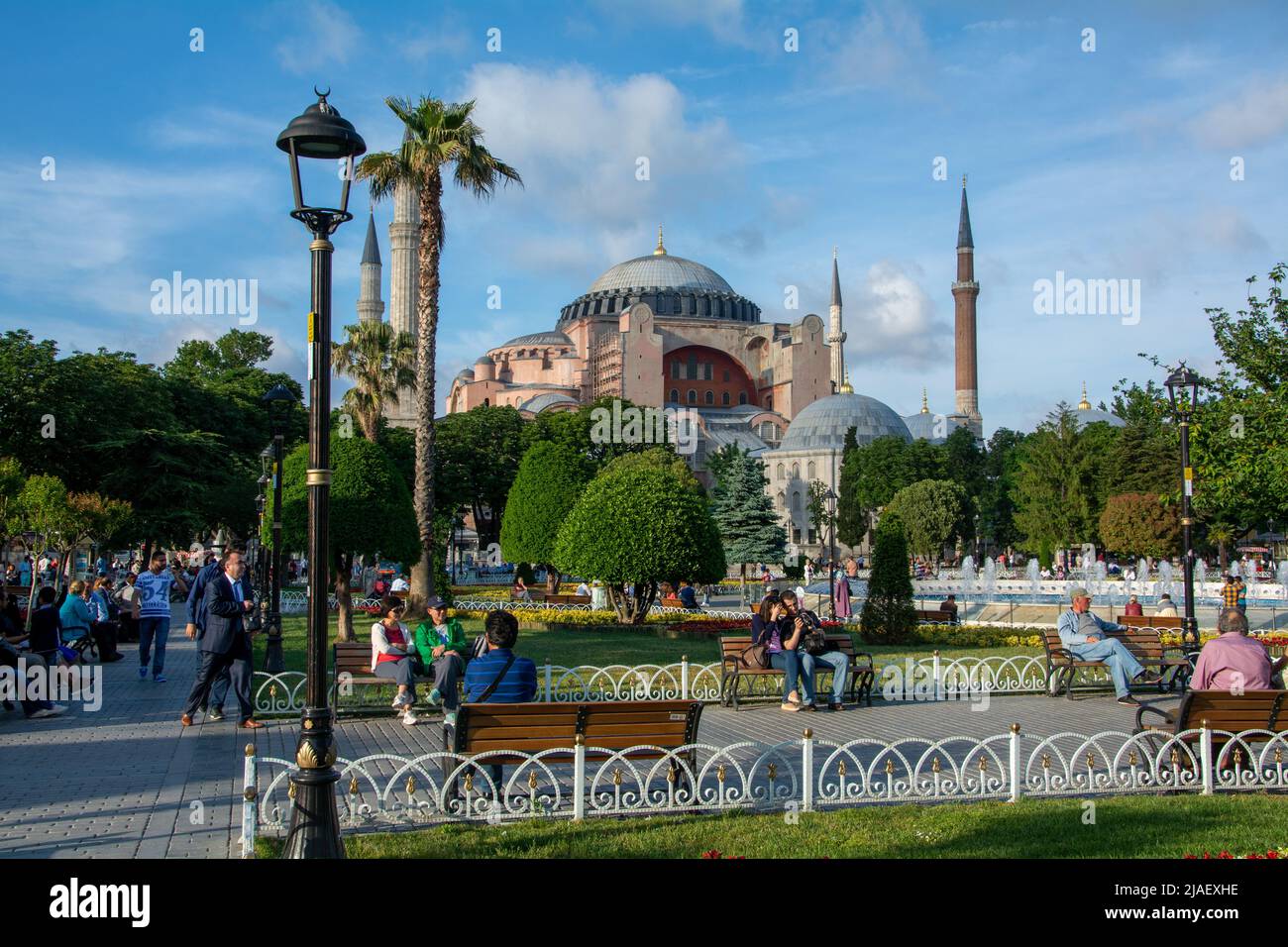 Tourists and locals around Sultanahmet park in front of the Hagia ...