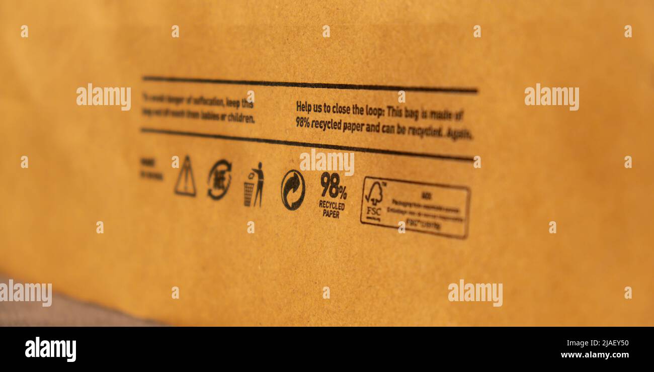Recycling bag Closeup view of pap sign and other eco-label on Brown ...