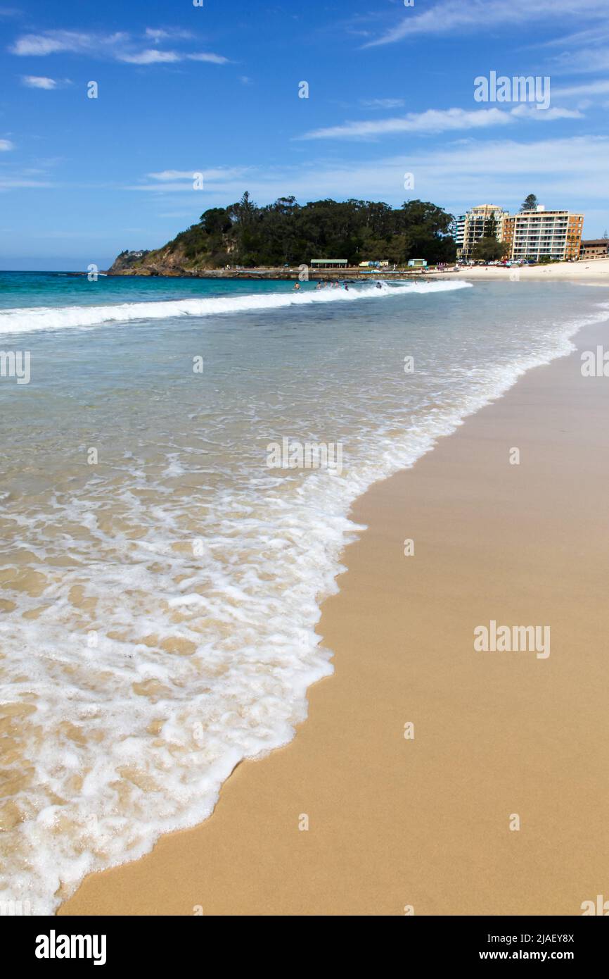 Beautiful Main Beach at Forster on the Mid North Coast of NSW in Australia on a nice sunny day. Forster is a popular tourist destination with many exc Stock Photo