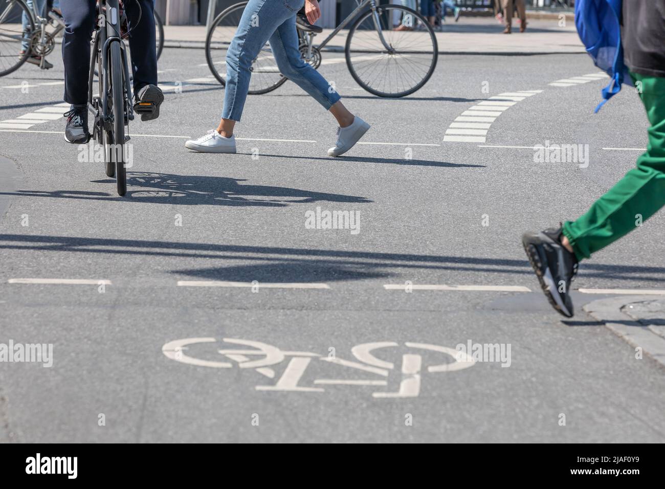 street scene with pedestrians and cyclists Stock Photo