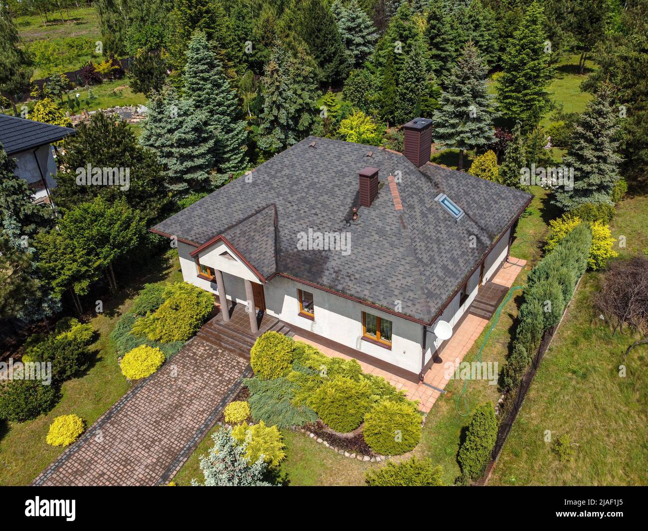 A small single-family house photographed from the air. Stock Photo