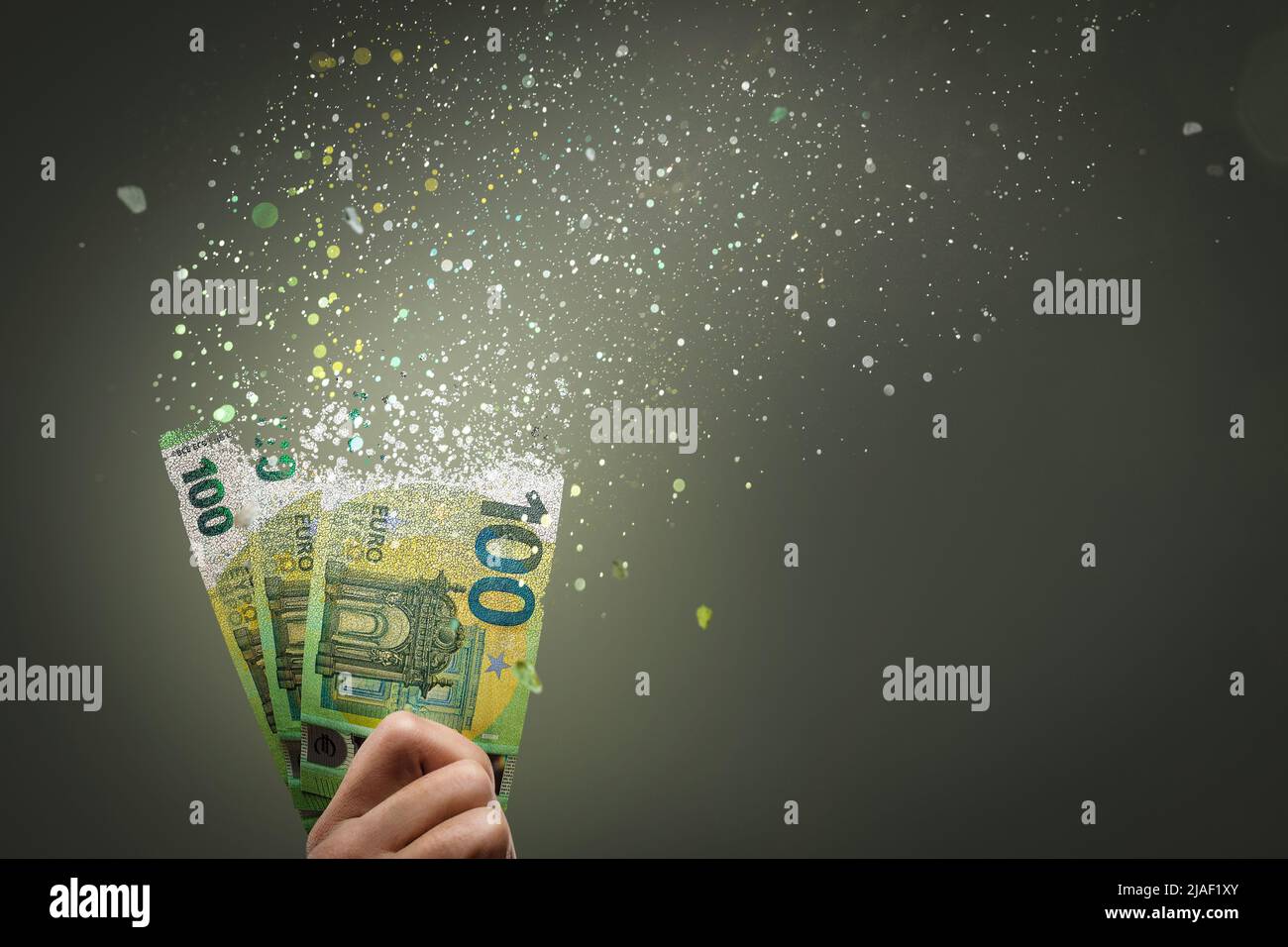 100 euro bills vanish into thin air Stock Photo