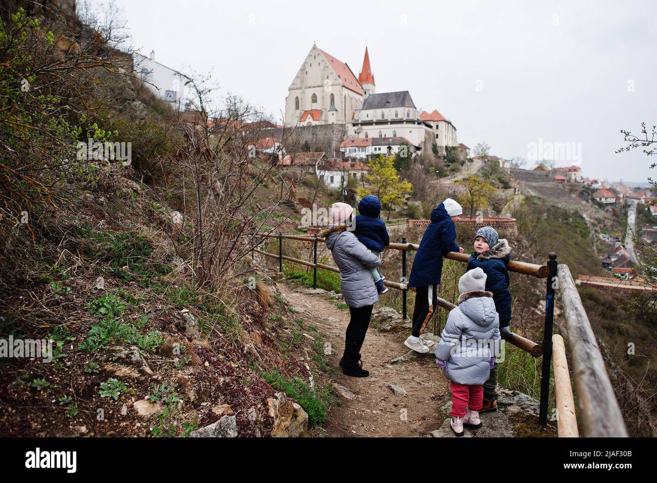 Mother with kids walking at Znojmo castle park in Czech Republic Stock Photo