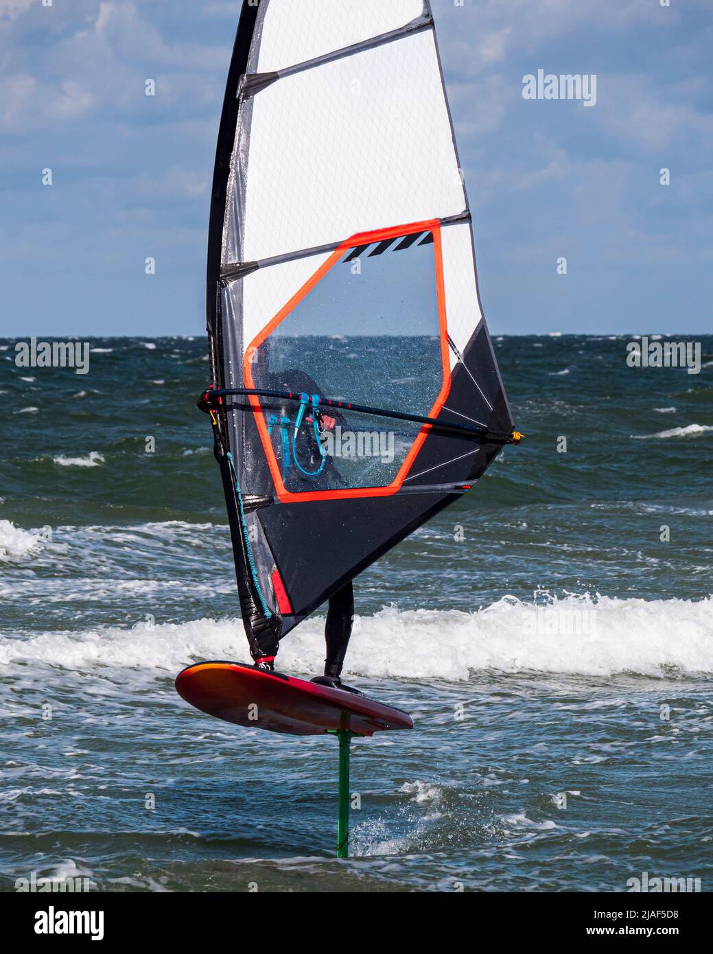 Wind Foil Surfer surf in the sea, close up Stock Photo