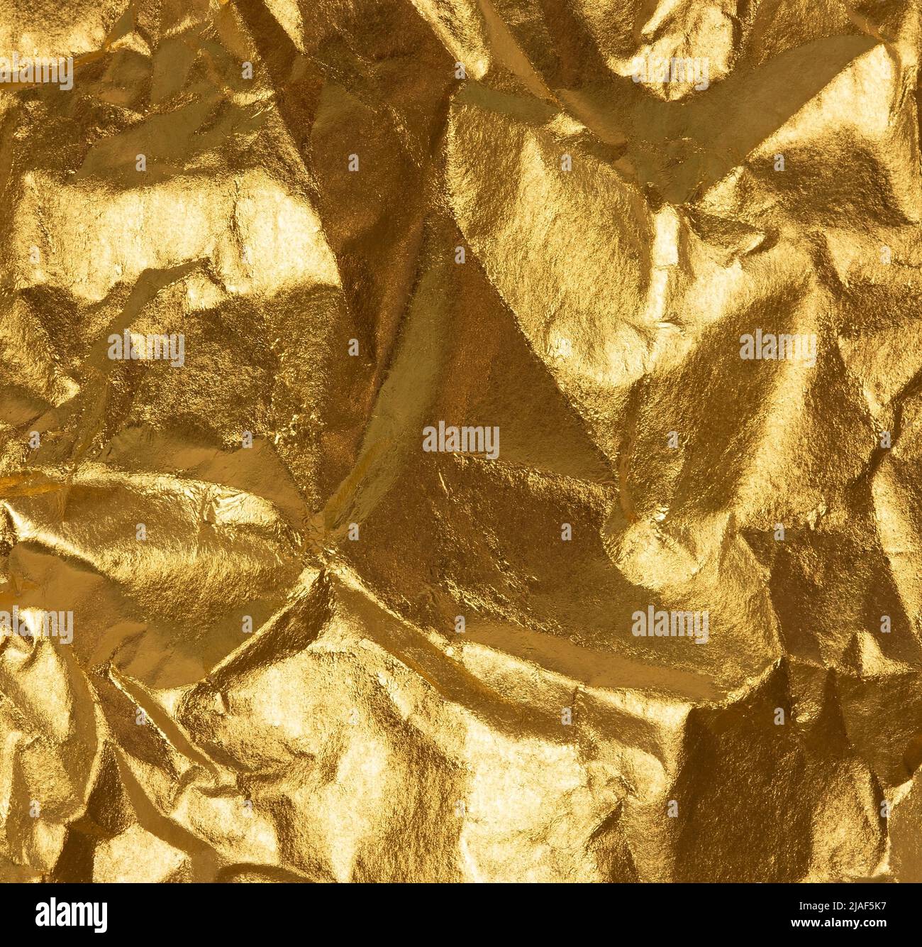 Wrinkled gold surface close up Stock Photo