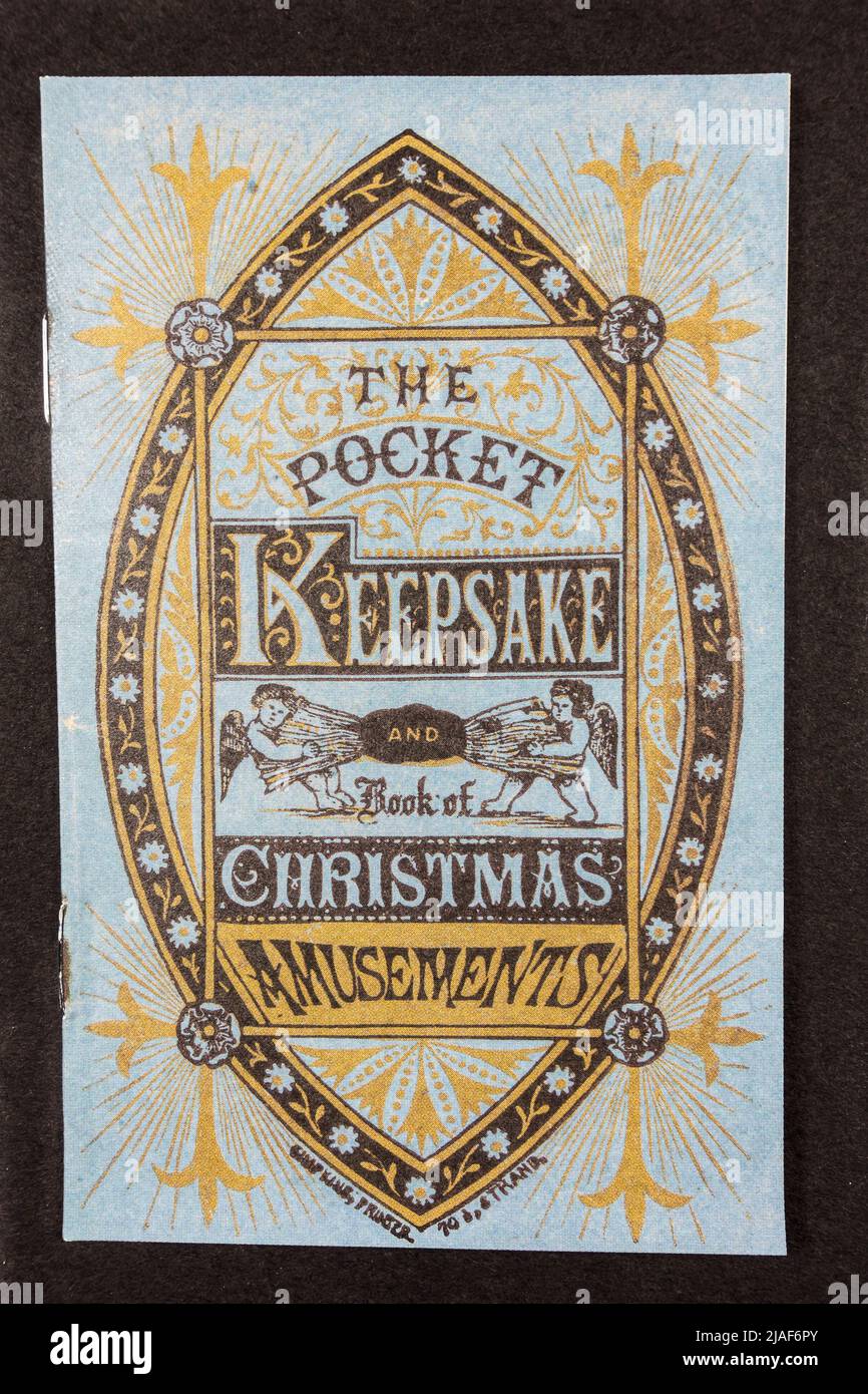 'The Pocket Keepsake and Book of Christmas Amusements' booklet, a piece of replica memorabilia related to Christmas. Stock Photo