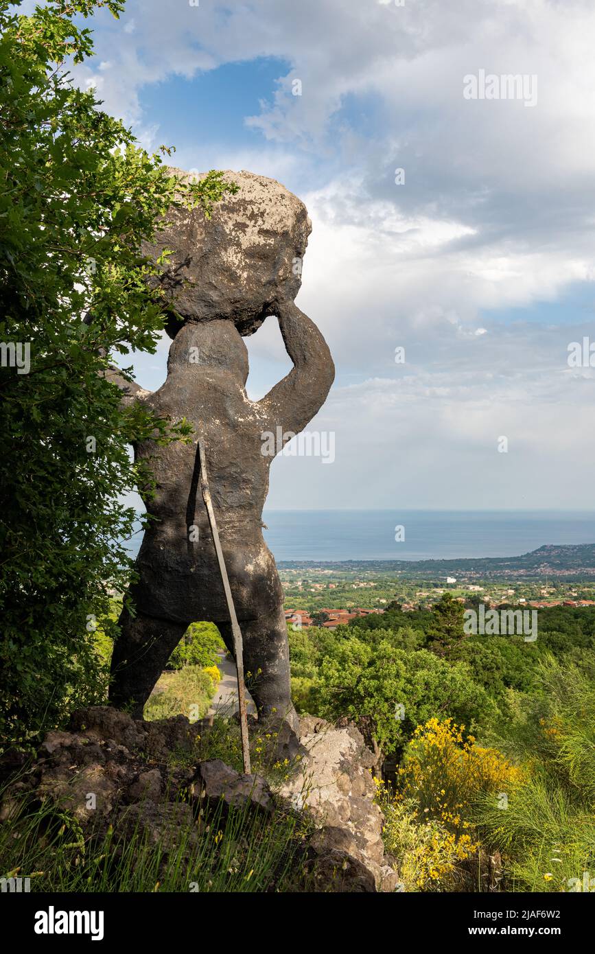 A statue of Polyphemus, the giant Cyclops tricked by Odysseus, stands outside a theme park above Zafferana Etnea, near Catania in Sicily, Italy Stock Photo
