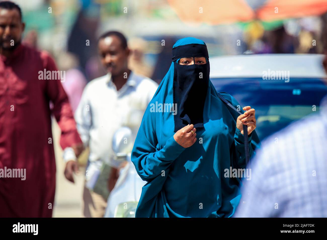 Muslim Woman in Hijab walking on the Capital Streets Stock Photo - Alamy
