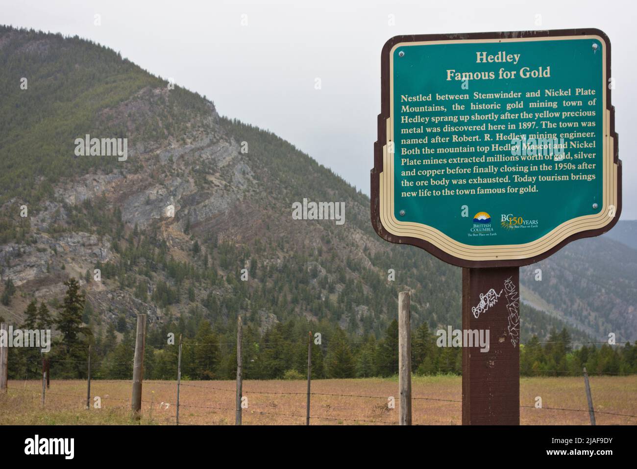 Sign for the town of Hedley, British Columbia, Canada.  The sign tells of its gold mining history. Stock Photo