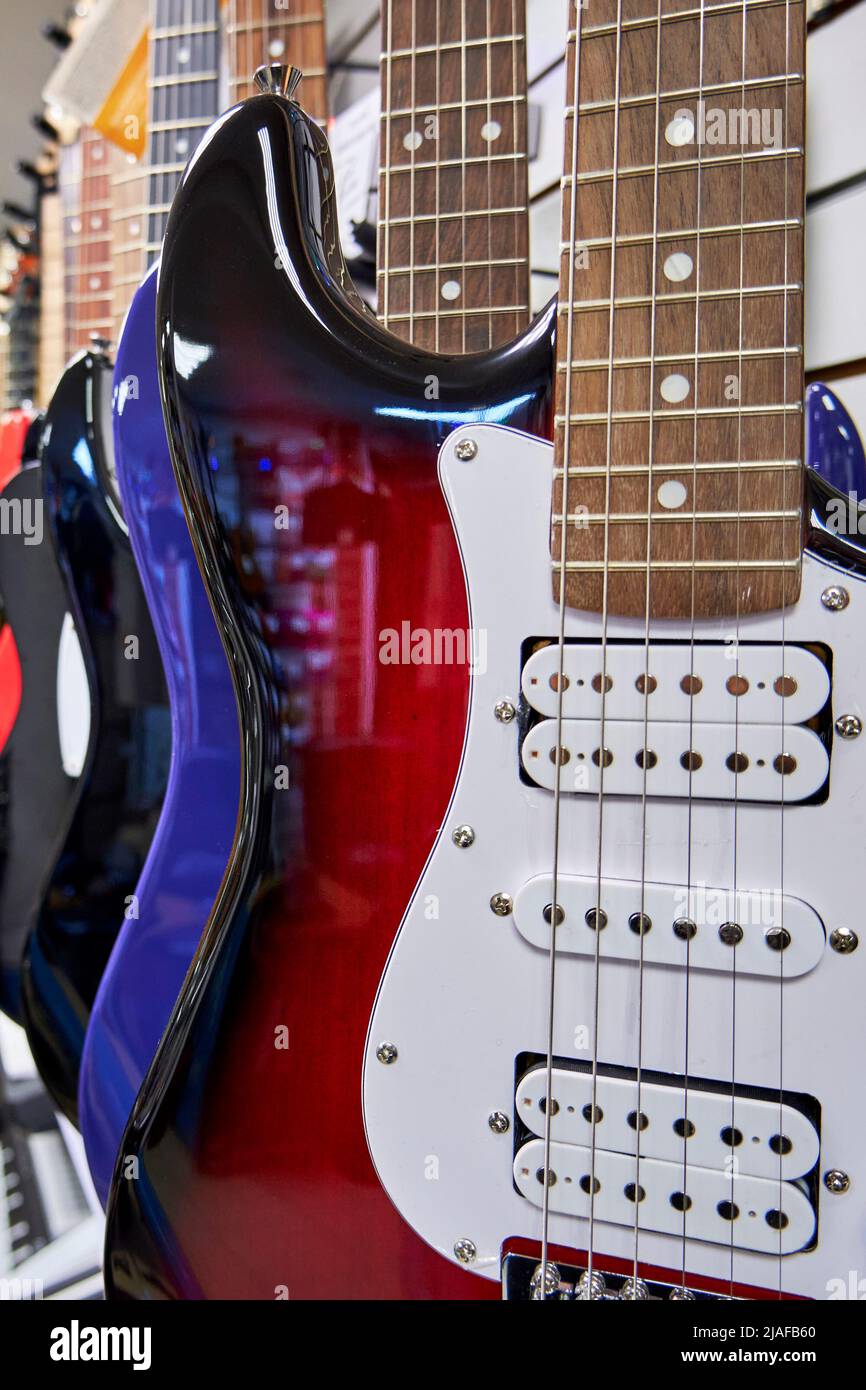 Electric guitars in a music store close up Stock Photo Alamy