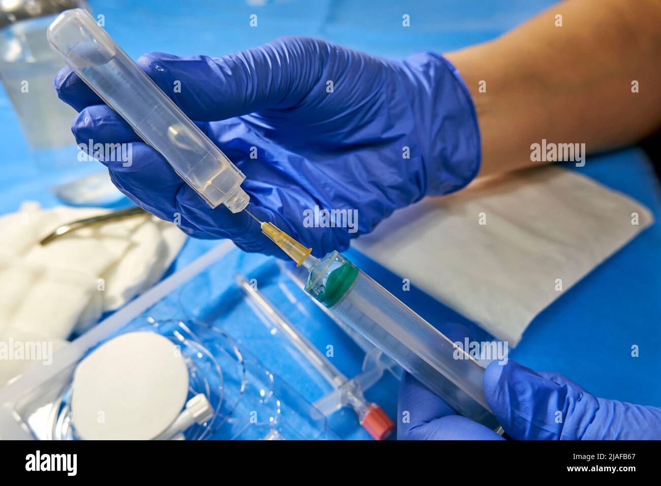 Injection of anesthetic into a syringe. Epidural anesthesia Stock Photo
