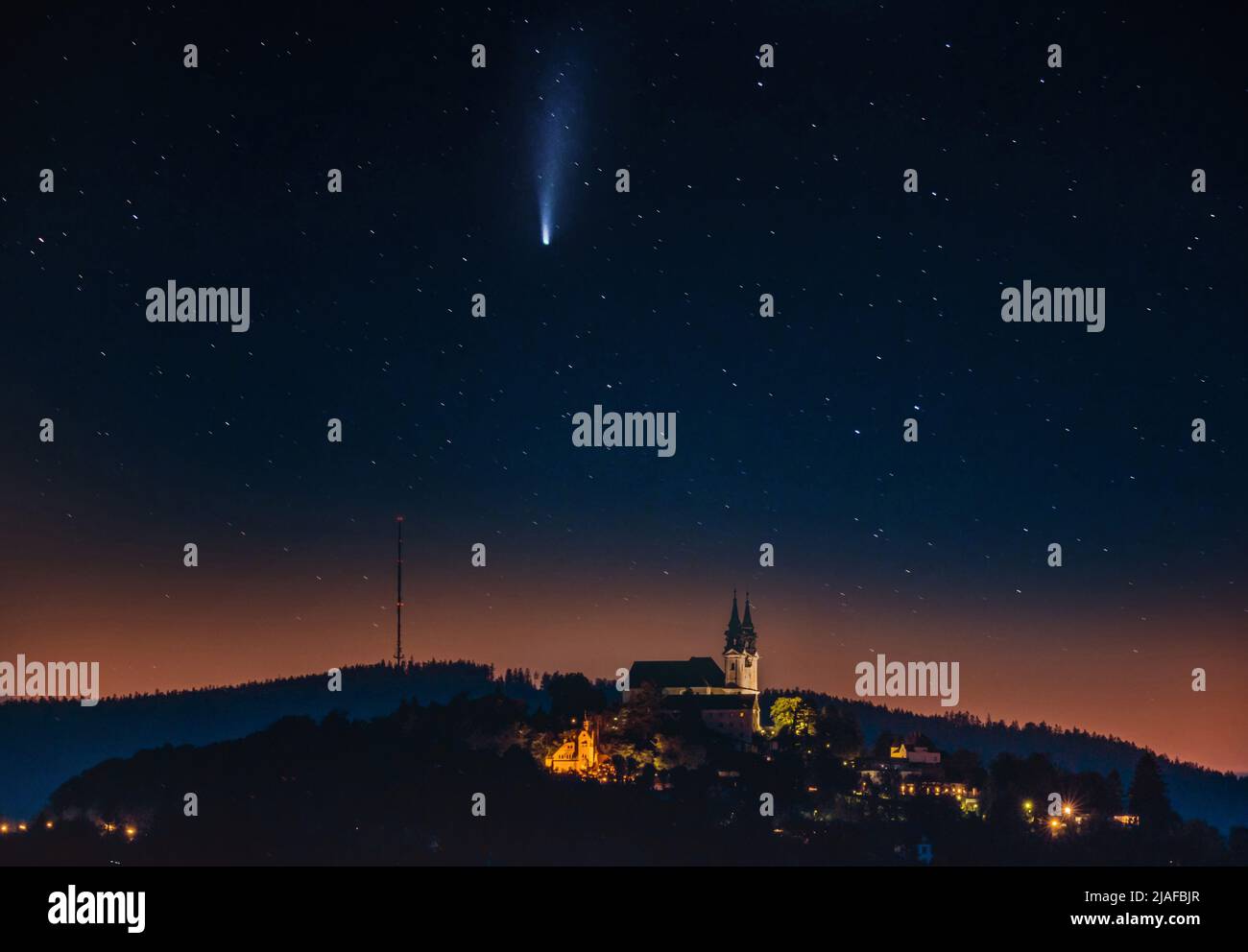 comet Neowise over the pilgrimage church Poestlingberg, Austria, Linz Stock Photo