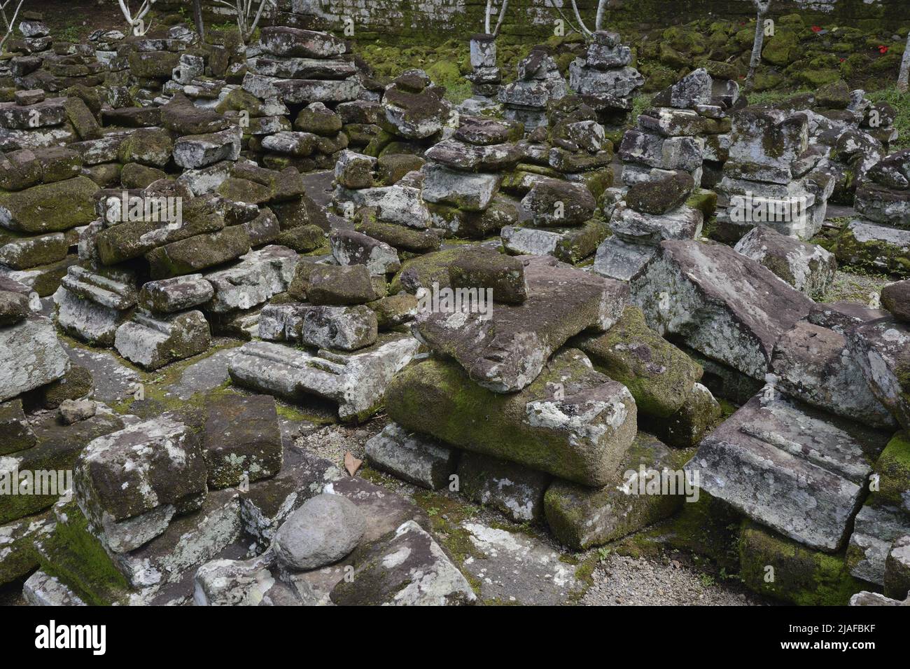 about 1100 years old stones at excavations of the wall in elephant temple Goa Gaja, Indonesia, Bali Stock Photo