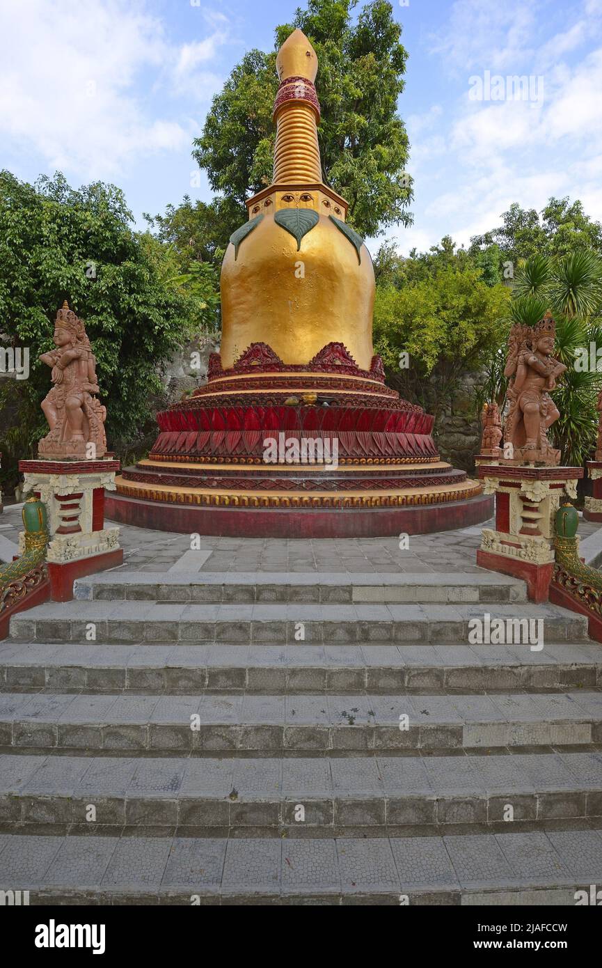 Golden pagoda in the outdoor area of the Buddhistic monastery Brahma Vihara, Indonesia, Bali, Banjar Stock Photo