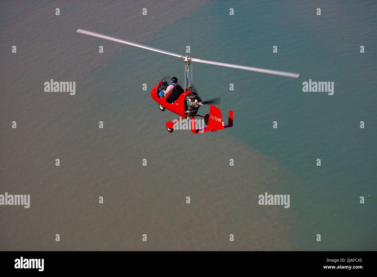 autogyro over the North Sea, Germany, Lower Saxony, Melum Stock Photo