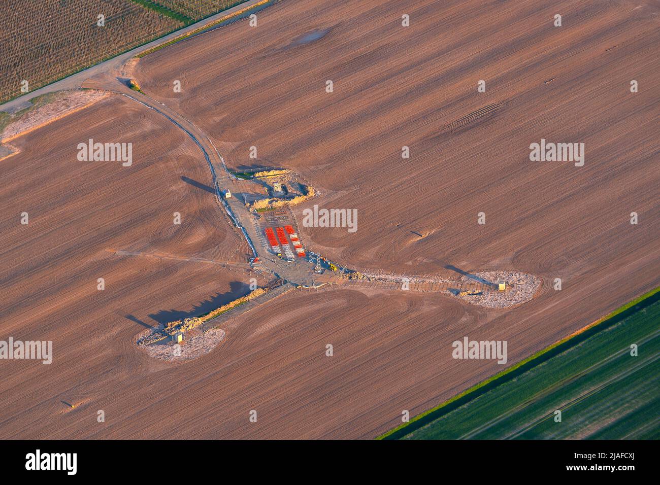 construction a a new windmill on a field, 18,04.2022, aerial view, Germany, Lower Saxony Stock Photo
