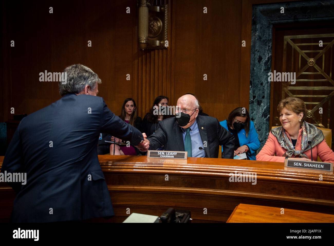 Federal Bureau of Investigation Director Christopher A. Wray, left, is greeted by United States Senator Patrick Leahy (Democrat of Vermont), Chairman, US Senate Committee on Appropriations, center, and United States Senator Jeanne Shaheen (Democrat of New Hampshire), right, as he arrives for a Senate Appropriations - Subcommittee on Commerce, Justice, Science, and Related Agencies hearing to examine proposed budget estimates and justification for fiscal year 2023 for the Federal Bureau of Investigation in the Dirksen Senate Office Building in Washington, DC, Wednesday, May 25, 2022. Credit: Ro Stock Photo