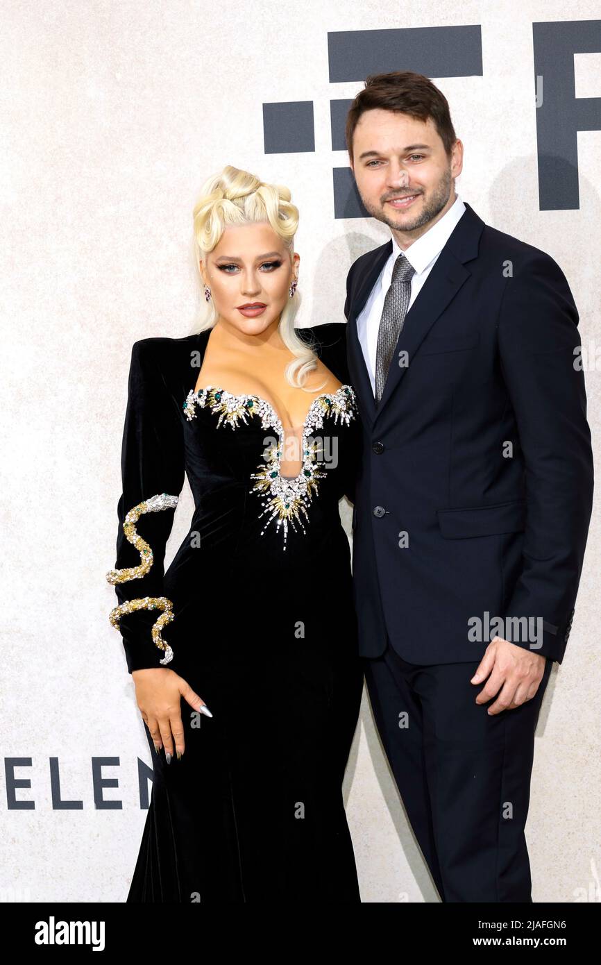 Christina Aguilera and Matthew Rutler attend the amfAR Gala Cannes 2022
