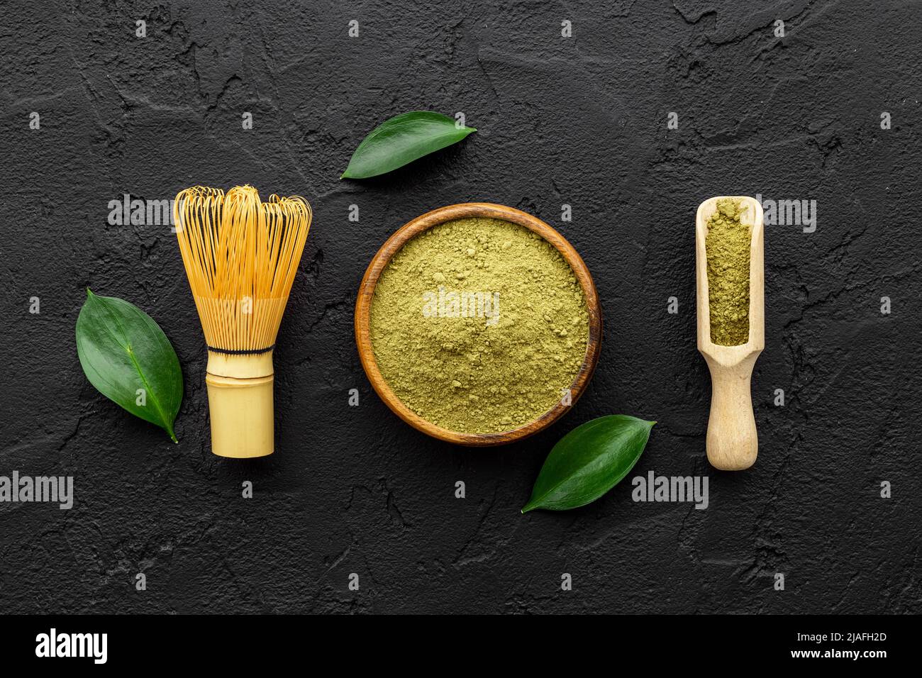 Matcha tea powder with green leaf. Asian beverage concept Stock Photo