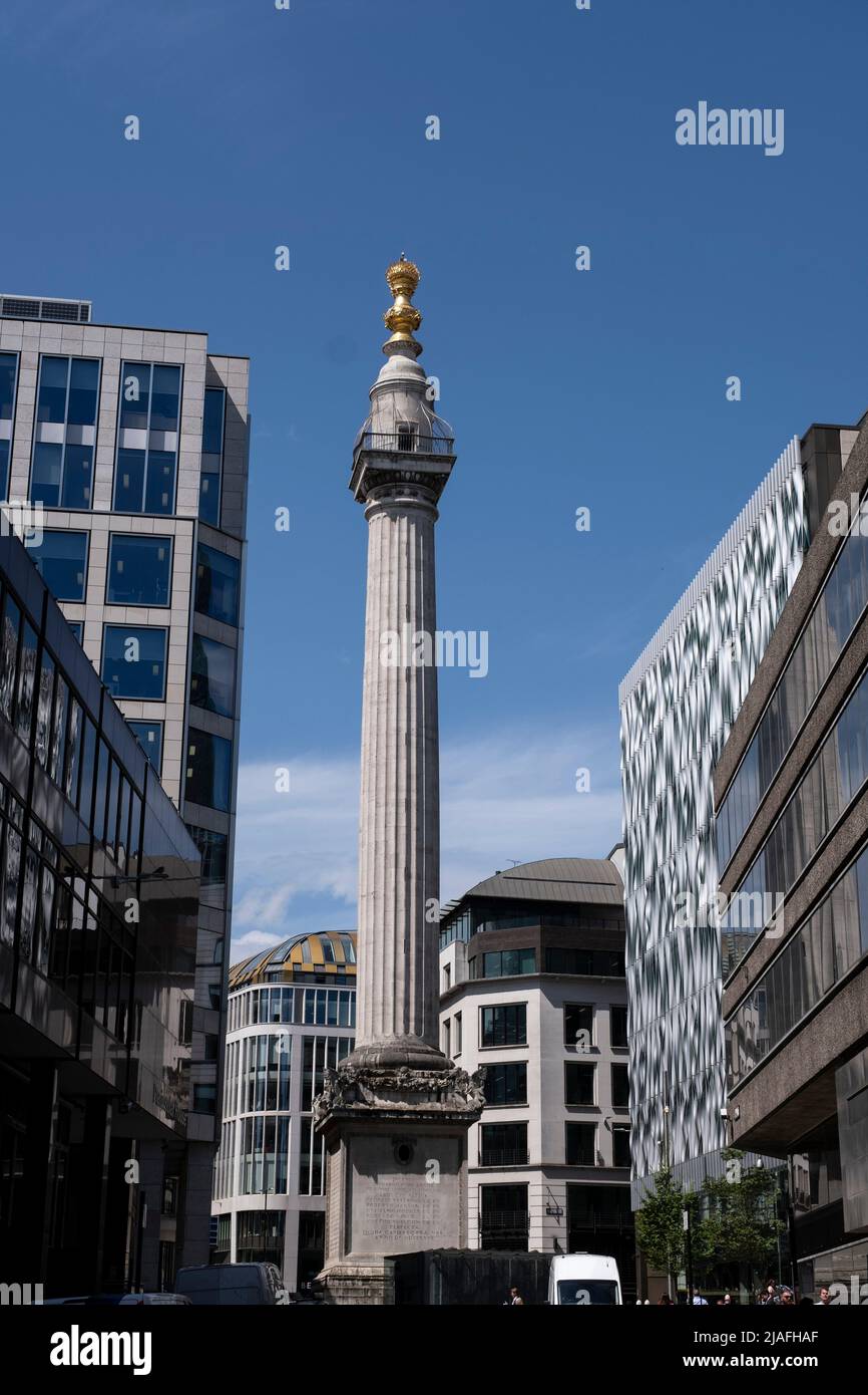 Monument, Sir Christopher Wrens flame-topped gold monument to the Great Fire of 1666 on 17th May 2022 in London, United Kingdom. Stock Photo