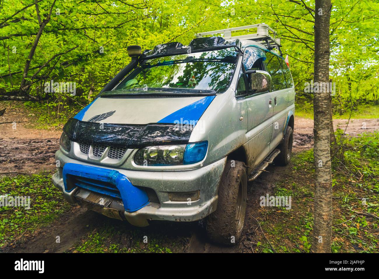 Bus in mud hi-res stock photography and images - Alamy