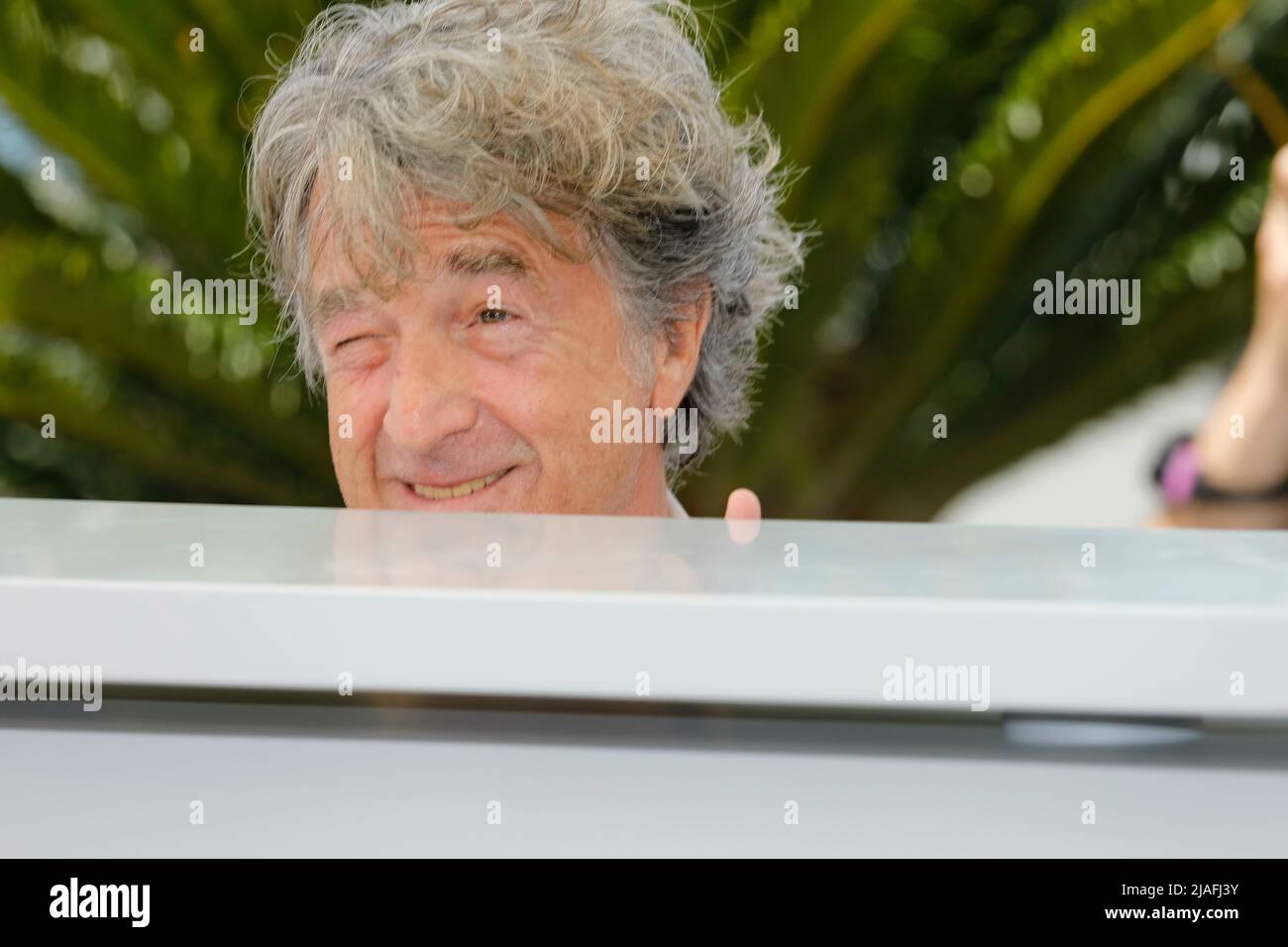 Francois Cluzet poses at the photocall of 'Masquerade' during the 75th Cannes Film Festival at Palais des Festivals in Cannes, France, on 28 May 2022. Stock Photo