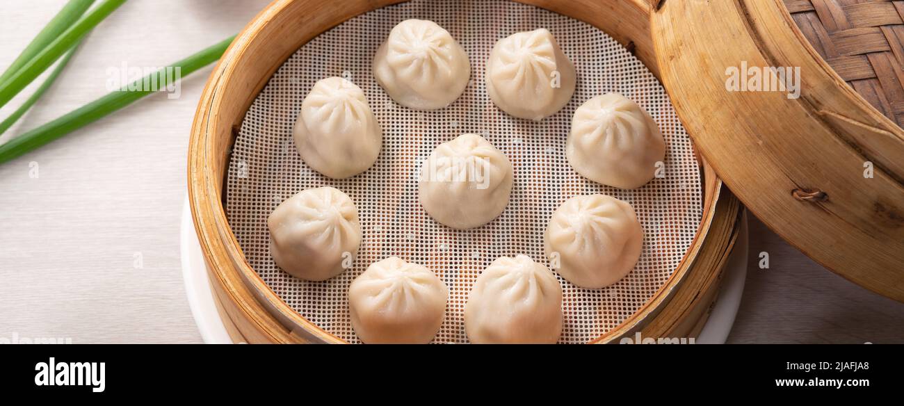 Steamed pork soup dumplings named Xiao long bao in Taiwan, Taiwanese famous gourmet Stock Photo