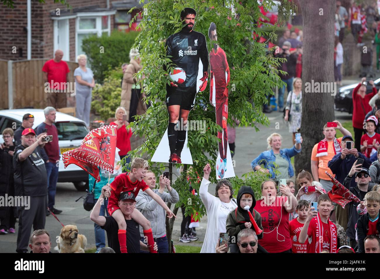 Cardboard cutouts of the players are arranged through the streets as the Liverpool FC squad