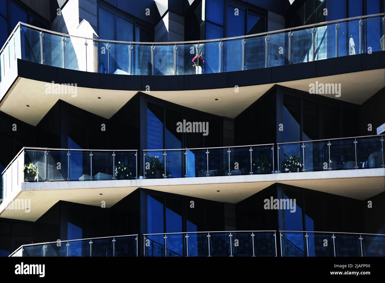 STACKED DECK Balconies of modern day luxury high rise apartments are