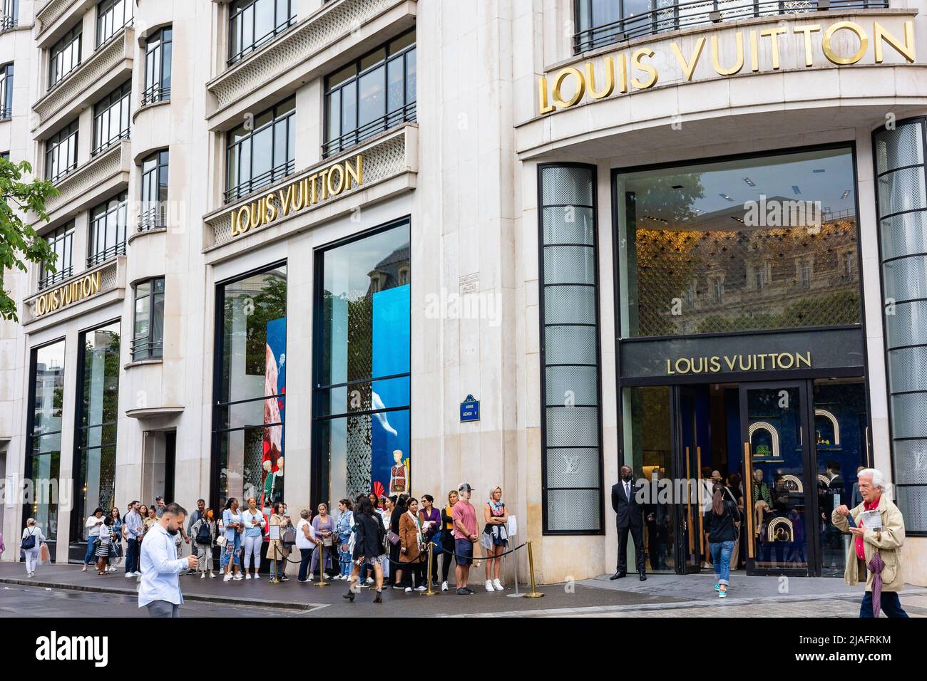 Louis Vuitton Fashion Luxury Store In Champs Elysees People Passing In Paris  France Stock Photo - Download Image Now - iStock