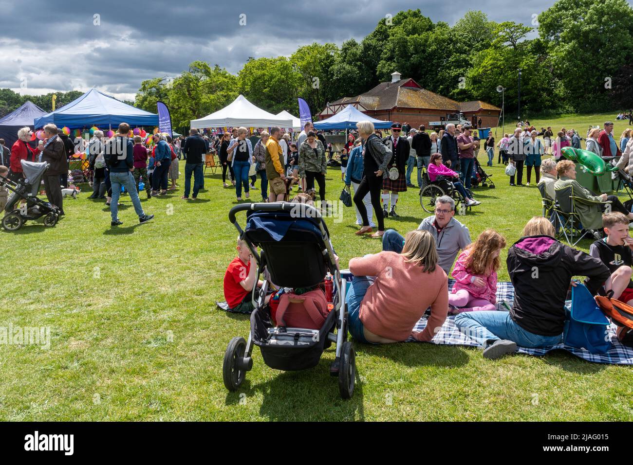 Crowds of people enjoying the Farnborough Donkey Derby event, May 2022, Hampshire, England, UK Stock Photo