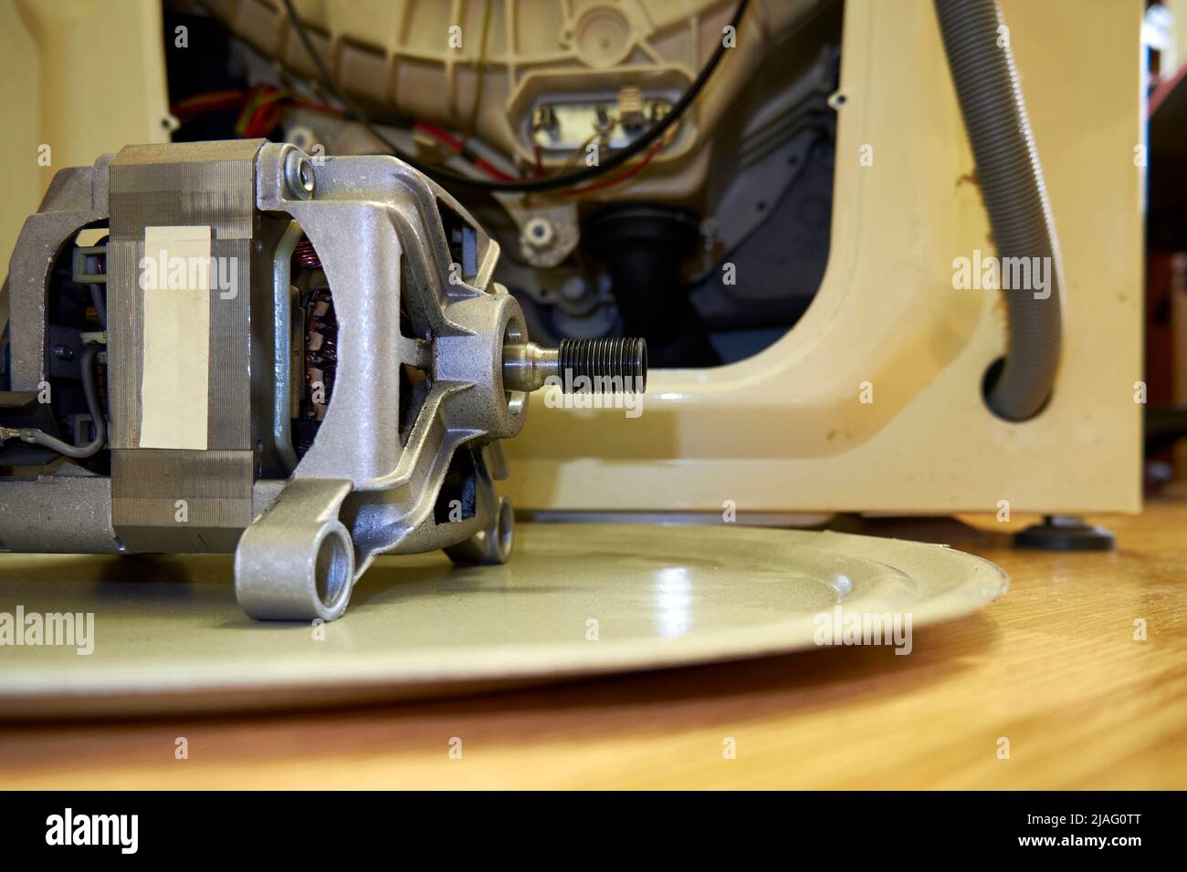 Disassembled washing machine electric motor. Washing machine repair