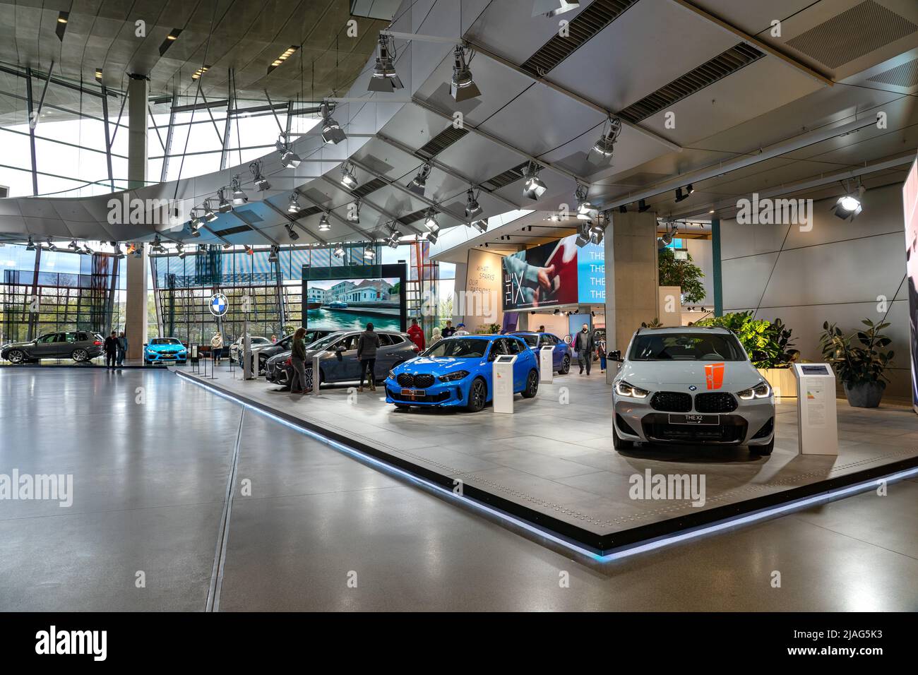 Munich, Germany - 04.08.2022: BMW World Munich showroom with cars and modern architecture Stock Photo