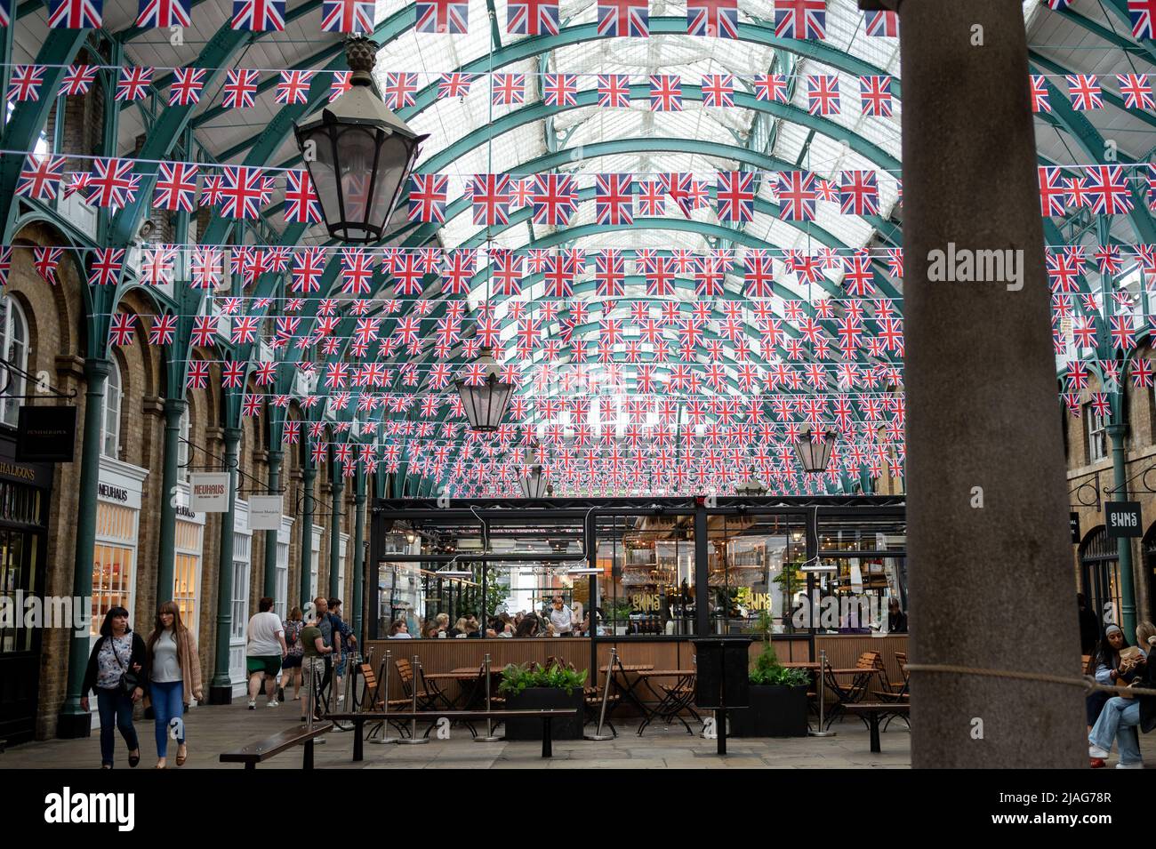inside covent garden with union jack flags celebration jubilee Stock Photo