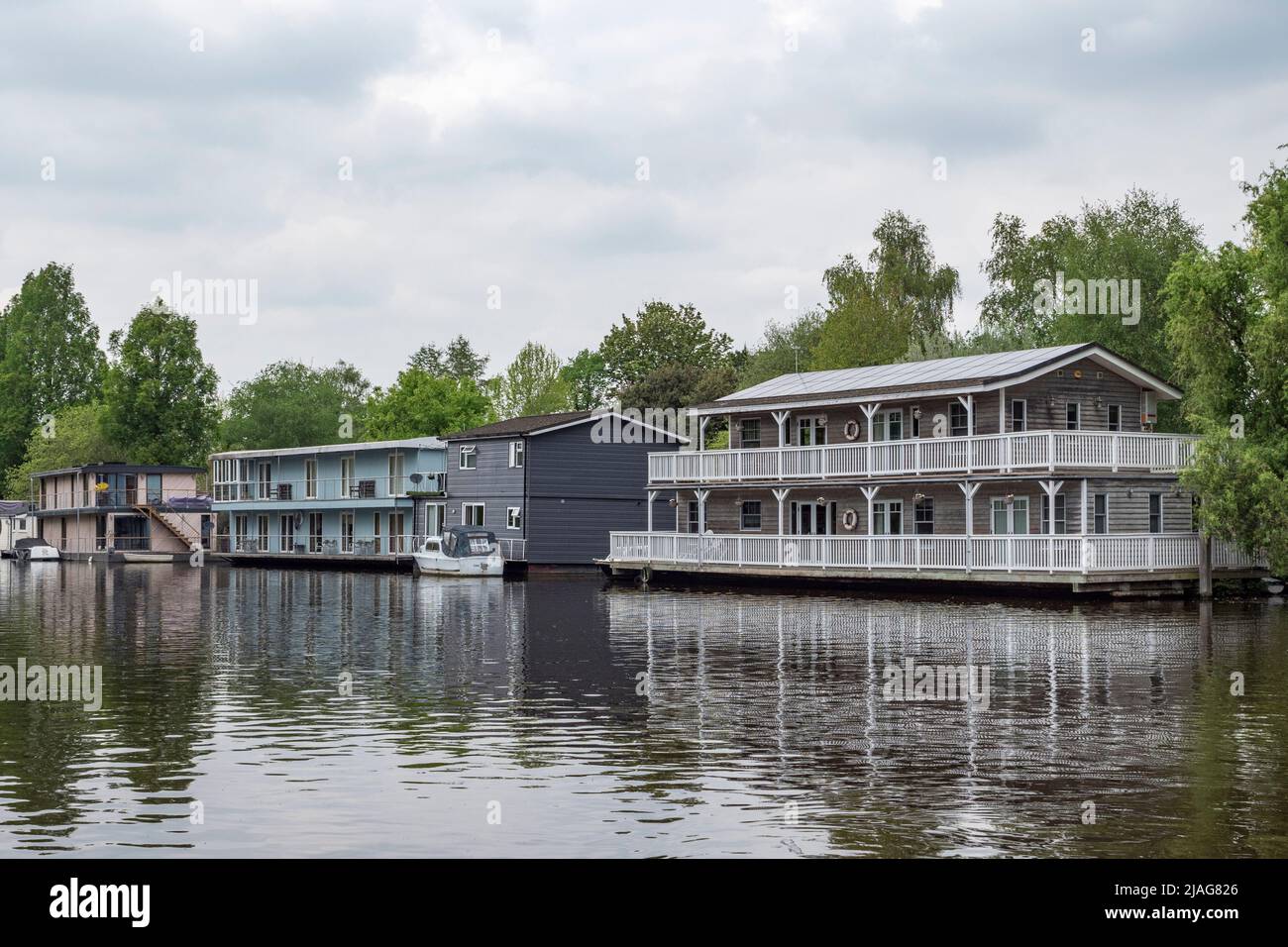 Houseboats on the River Thames in Hampton, West London, UK Stock Photo
