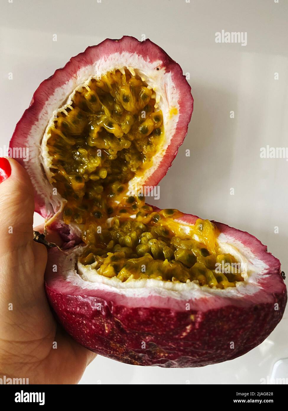 The passion fruit fruit, very popular in Brazil, intended for making sweets and juices. An exotic ingredient in many menus. Stock Photo