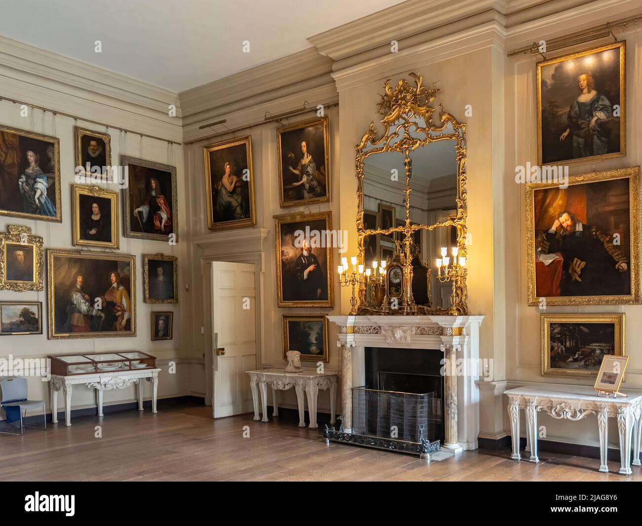 The Square Dining Room at Petworth House in West Sussex, United Kingdom.  Petworth is a late 17th-century Grade I listed country house, rebuilt in 168 Stock Photo